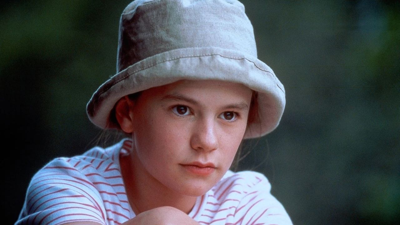 Anna Paquin in a bucket hat and stripes